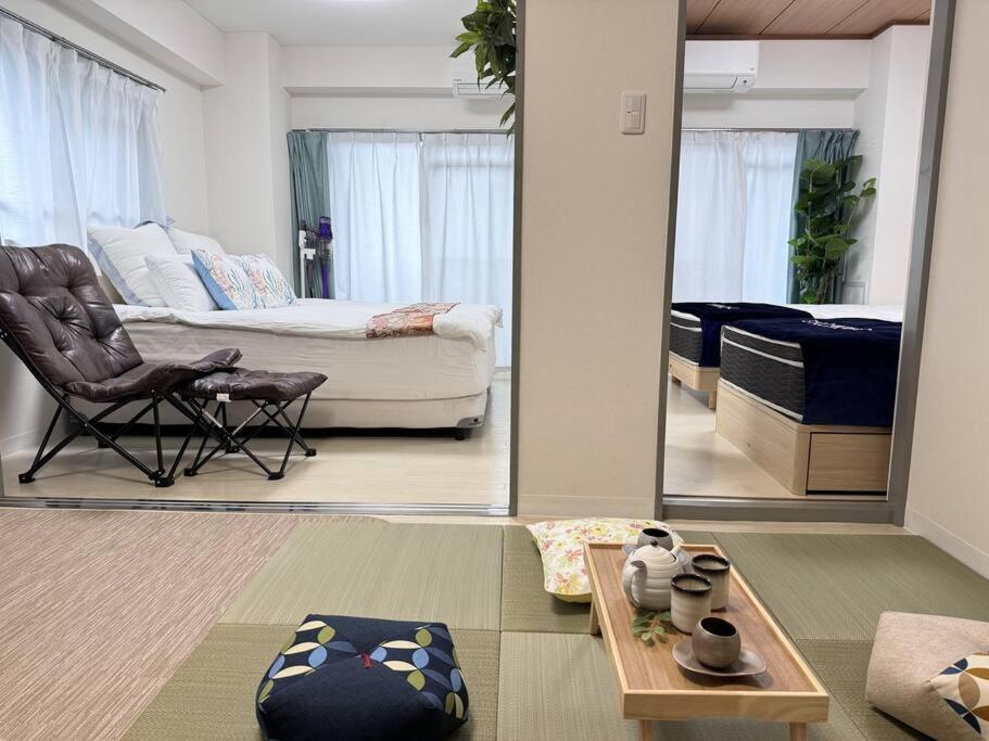 Apartamento 元桜上野浅草高級民泊最大8人駅6分高級ブランドベッド家庭映画館無料自転車